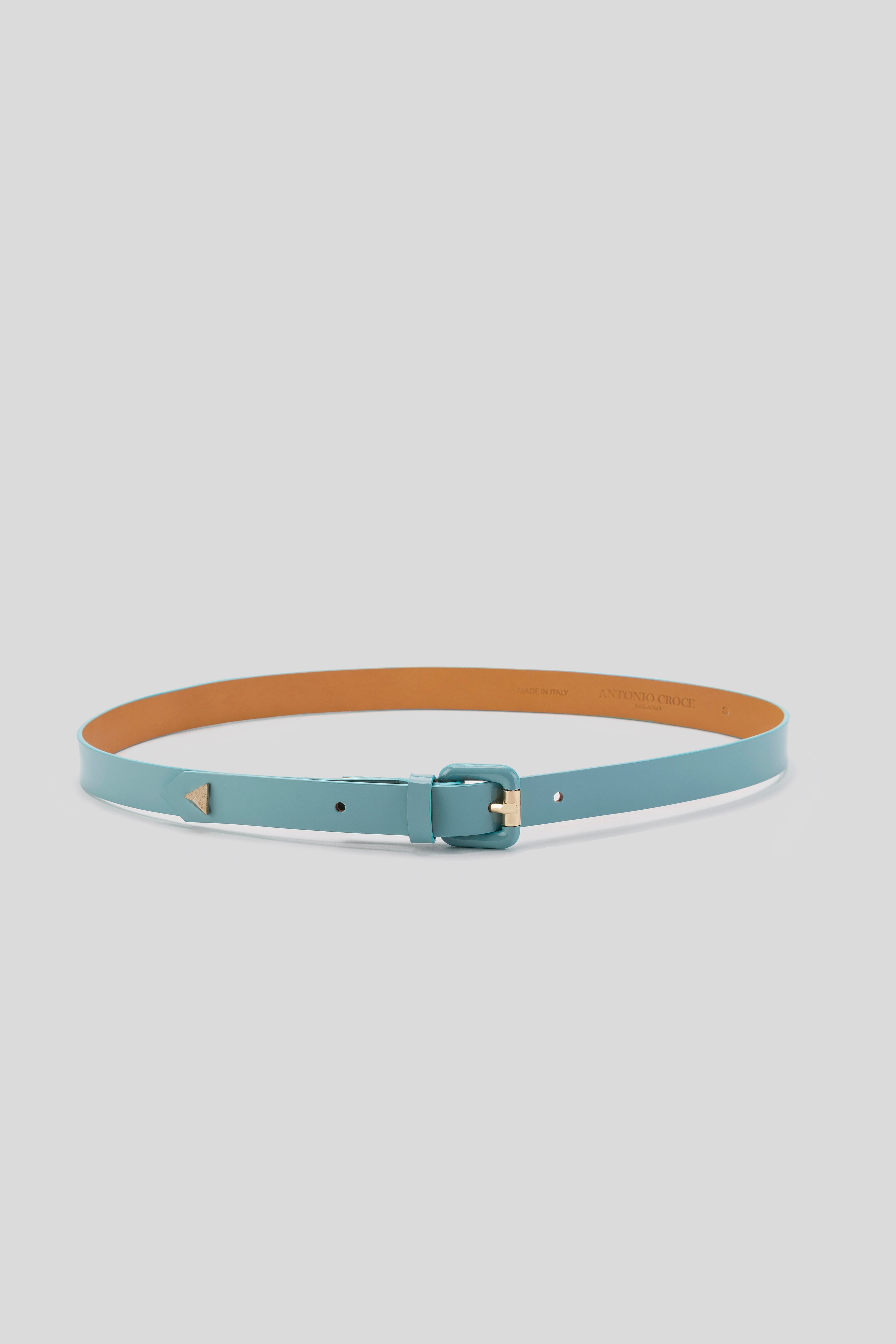 The Antonio Croce Linzi Leather Belt is displayed flat on a light gray background. This vintage turquoise belt features an adjustable buckle with subtle gold accents at the buckle and tip, and includes multiple holes for easy adjustments.