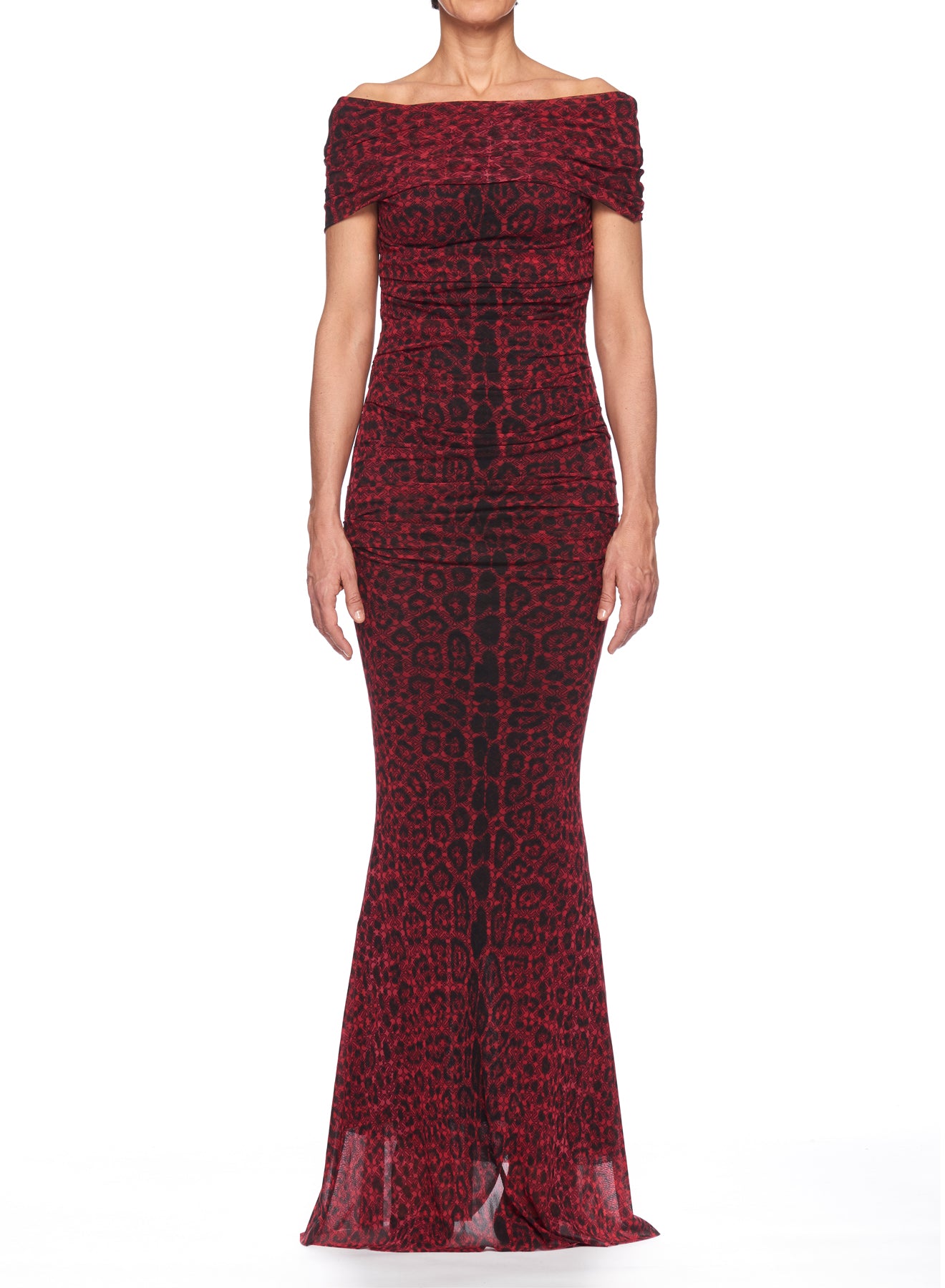 A person wearing a Fuzzi Woman Leopard Print Mesh Maxi Dress, designed with an off-shoulder neckline and a floor-length mermaid silhouette, standing against a plain white background.