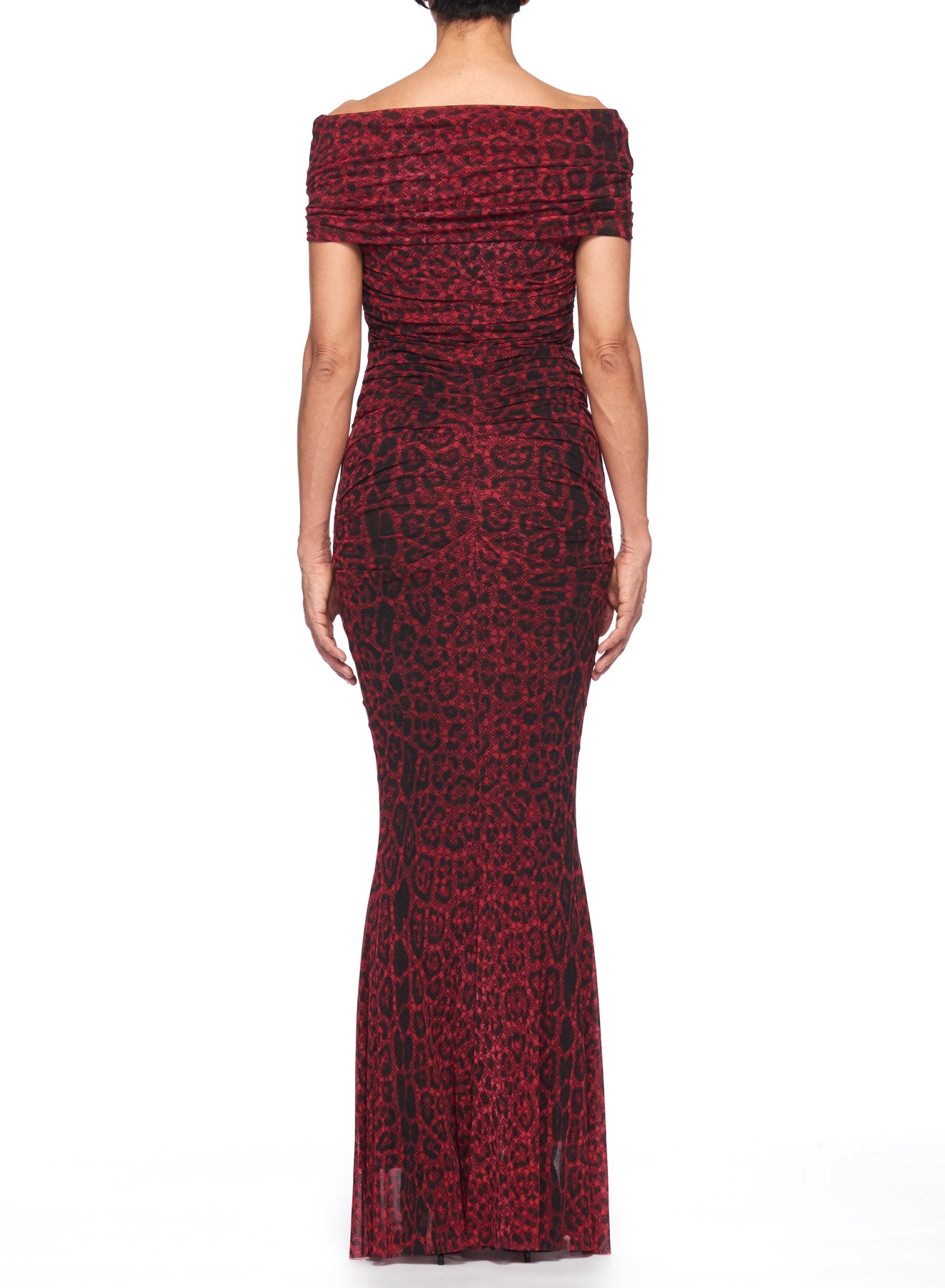 A person is wearing the Fuzzi Woman Leopard Print Mesh Maxi Dress, showcasing an off-the-shoulder design in a mesh fabric with a floor-length mermaid silhouette. They are standing with their back to the camera against a white background, highlighting the dress's form-fitting shape and elegant ruching details at the top.